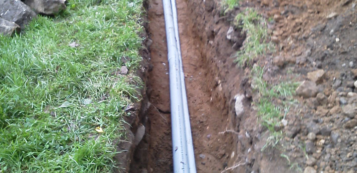 In-ground conduit for residential standby generator.